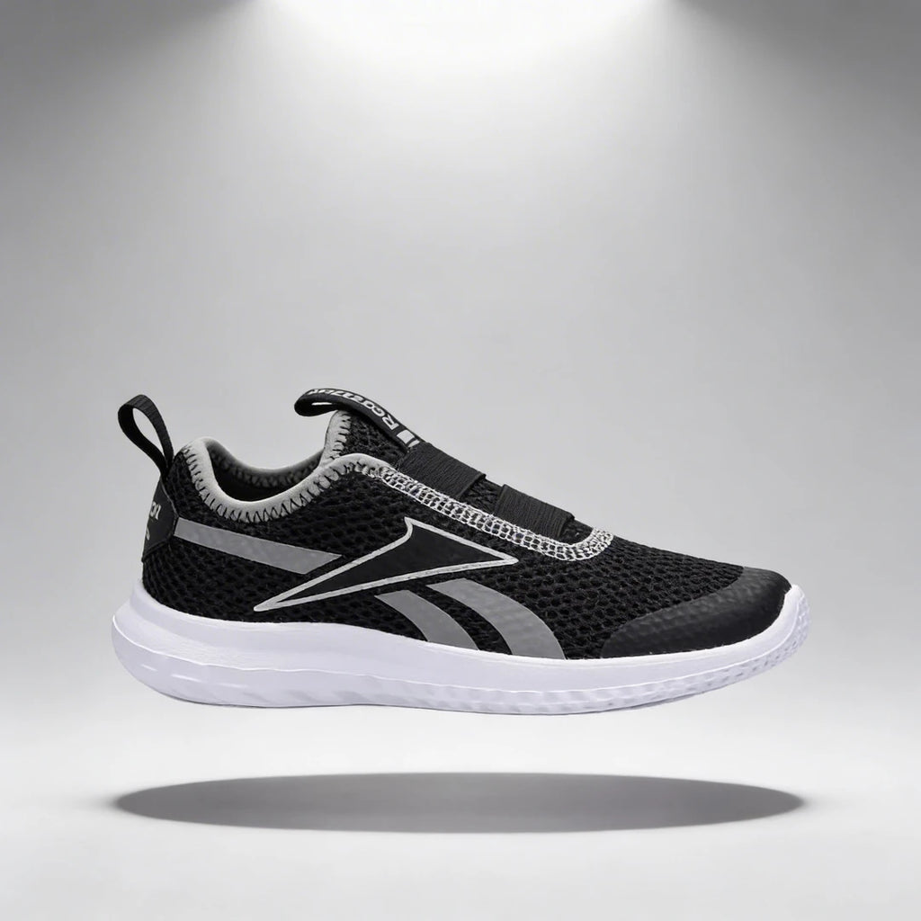 Baskets Enfant et Bébé Reebok Reebok Rush Runner Slip On profil gauche fond studio - BirdNova Algérie