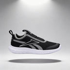 Baskets Enfant et Bébé Reebok Reebok Rush Runner Slip On profil gauche fond studio - BirdNova Algérie