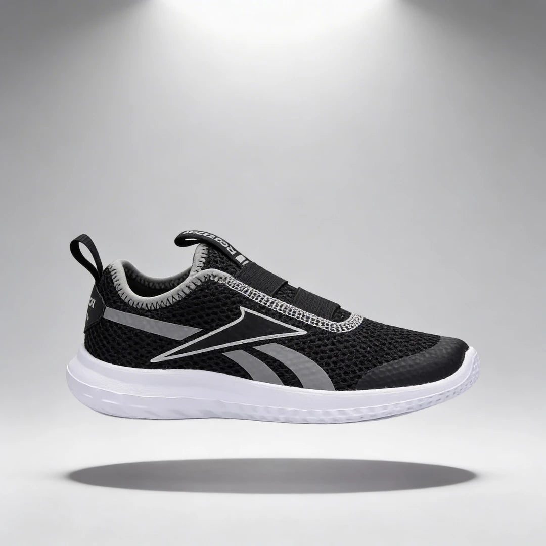 Baskets Enfant et Bébé Reebok Reebok Rush Runner Slip On profil gauche fond studio - BirdNova Algérie