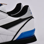 Détail du talon et de l'insert bleu des Baskets Hommes Reebok Classic Leather Clip Ftwwht/Purgry/Vecb - BirdNova Algérie