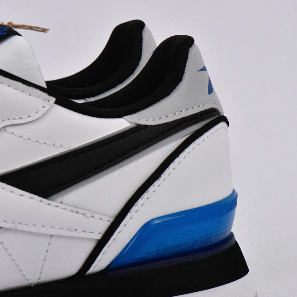 Détail du talon et de l'insert bleu des Baskets Hommes Reebok Classic Leather Clip Ftwwht/Purgry/Vecb - BirdNova Algérie