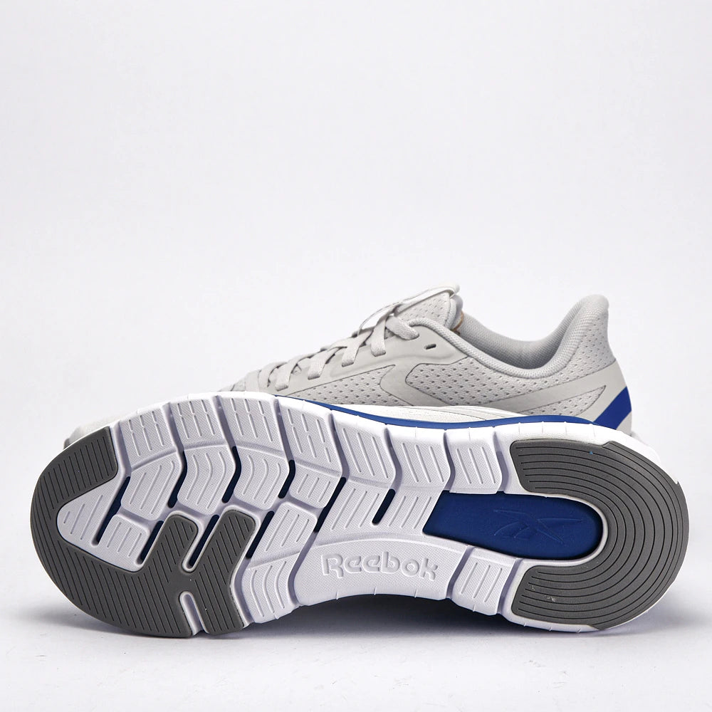 Baskets Hommes Reebok REEBOK FLEX TRAINER vue de profil gauche - BirdNova Algérie