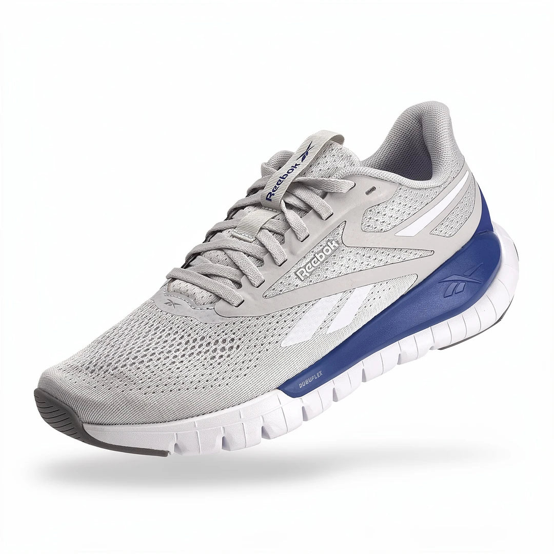 Baskets Hommes Reebok Reebok Flex Trainer vue trois-quarts fond studio - BirdNova Algérie