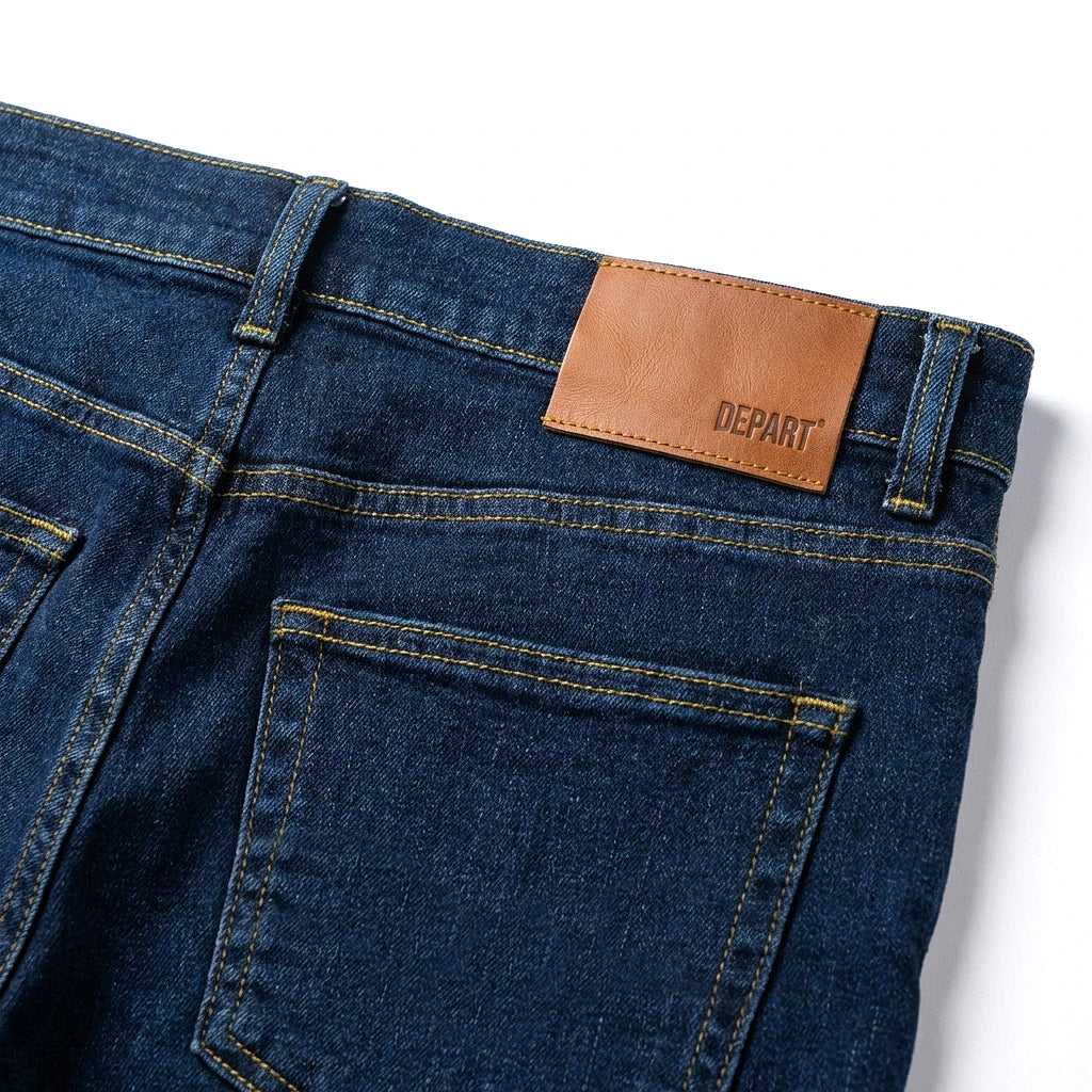 Patch cuir orange et poche arrière du Depart Jean Slim Bleu Indigo — original BirdNova Algérie