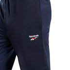 Reebok Pantalon De Survêtement Marine, gros plan sur le logo Reebok blanc de la cuisse, BirdNova Algérie