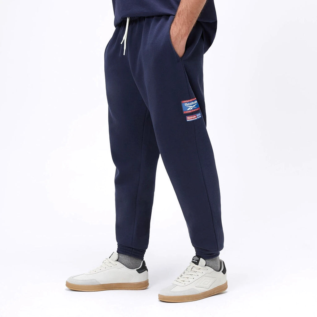 Reebok Jogging Bleu Marine Homme de profil — jogging original BirdNova Algérie
