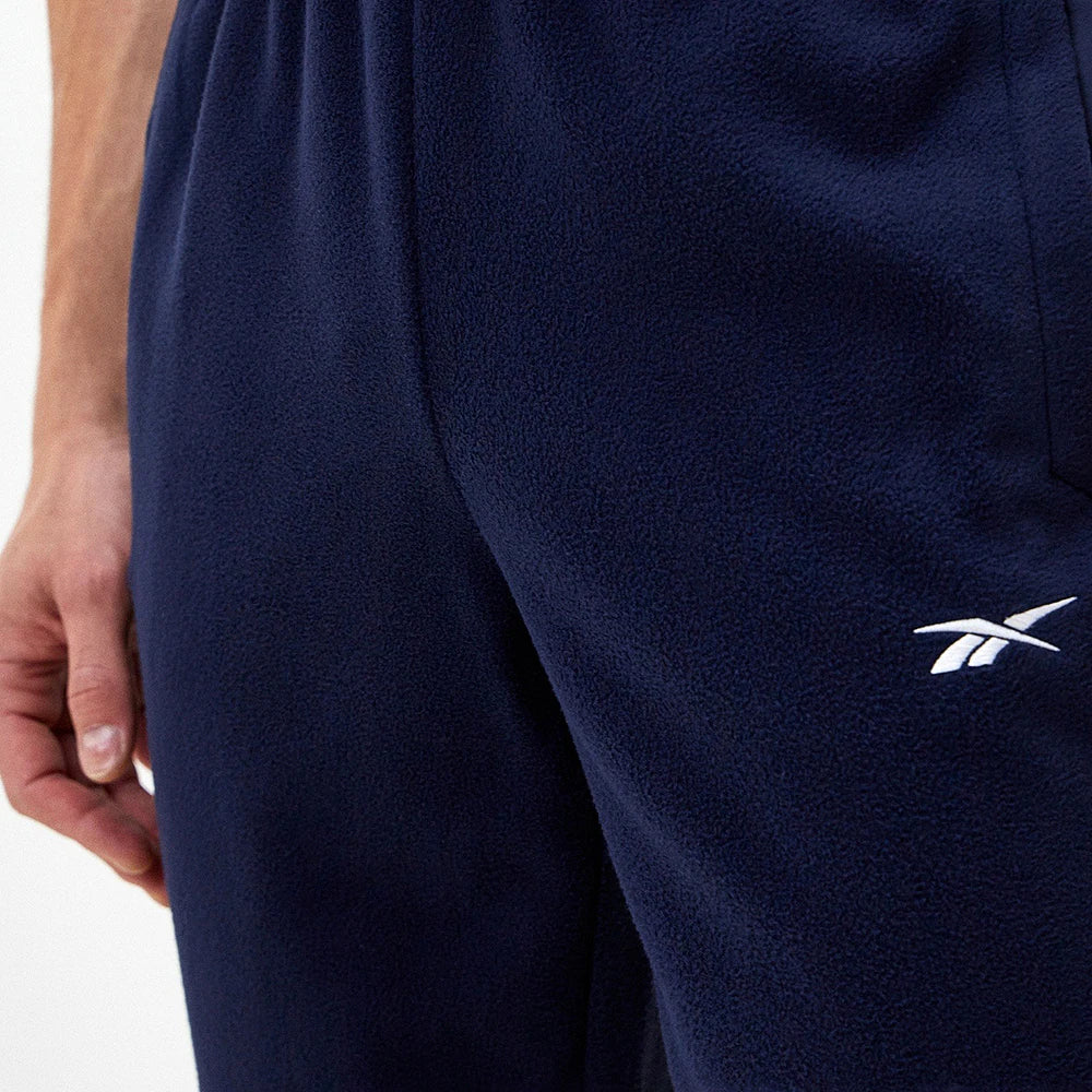 Reebok Pantalon De Sport Marine, gros plan sur le petit logo blanc, BirdNova Algérie