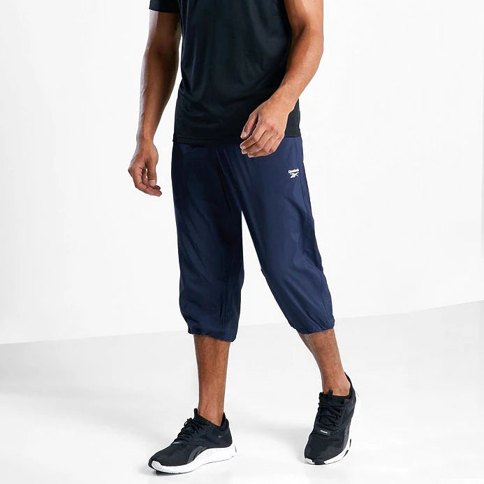 Reebok Pantalon 3/4 Bleu Marine Homme, vue de face portée, BirdNova Algérie