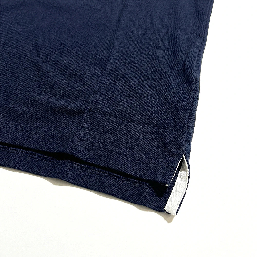 Poignet côtelé et maille texturée du polo Pepe Jeans marine — original BirdNova Algérie