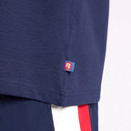Reebok T-Shirt Bleu Marine, gros plan sur la petite étiquette colorée du bas, BirdNova Algérie