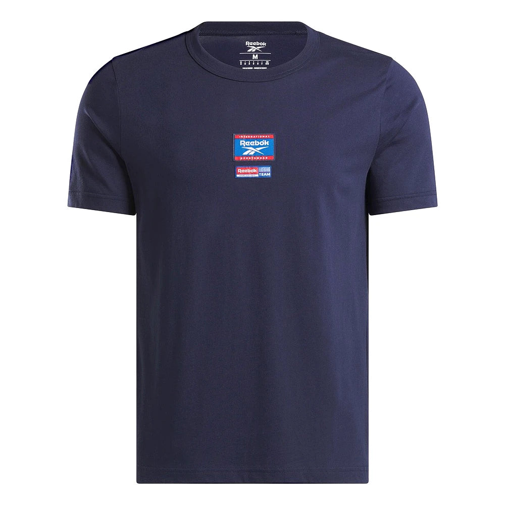 Reebok T-Shirt Bleu Marine, vue à plat avec badge et étiquette du col, BirdNova Algérie