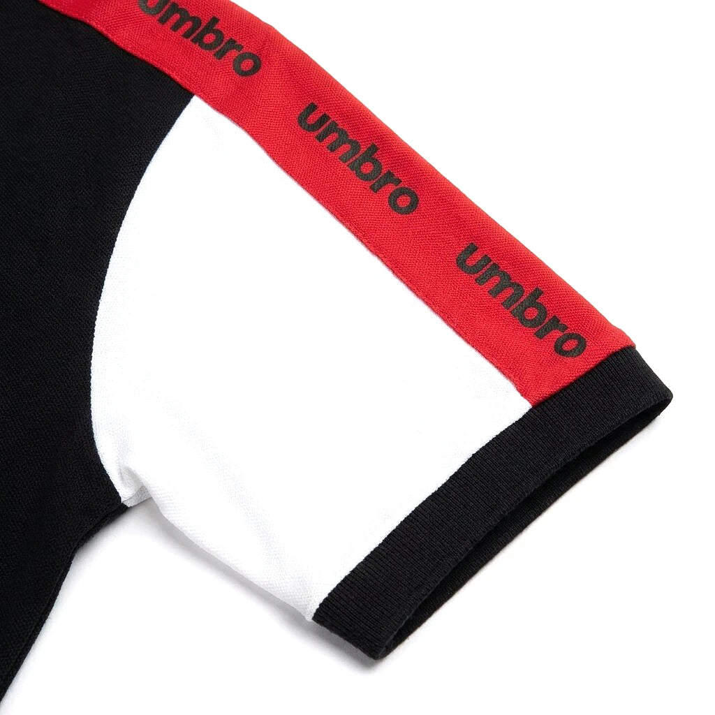 Umbro Polo Noir — manche blanche à bande rouge Umbro, original BirdNova Algérie