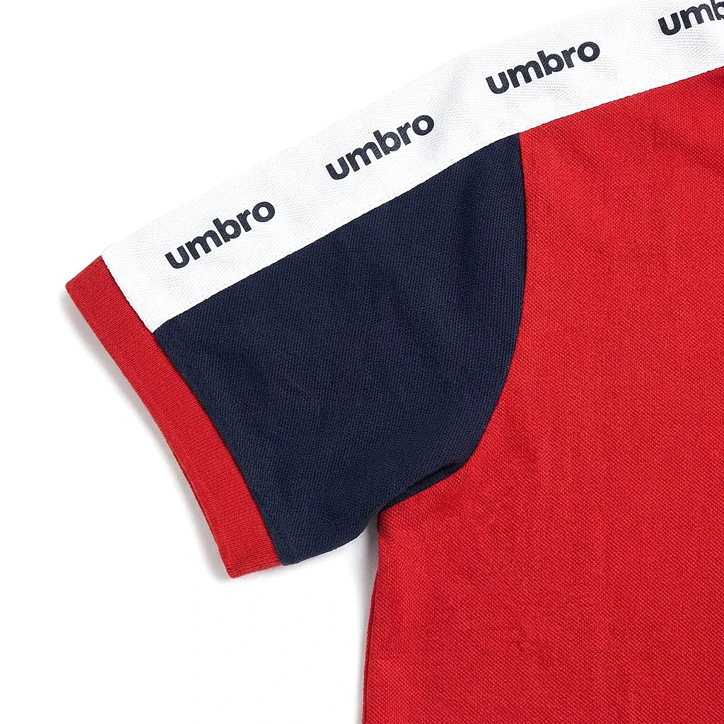 Umbro Polo Rouge — manche marine et bande Umbro blanche, original BirdNova Algérie