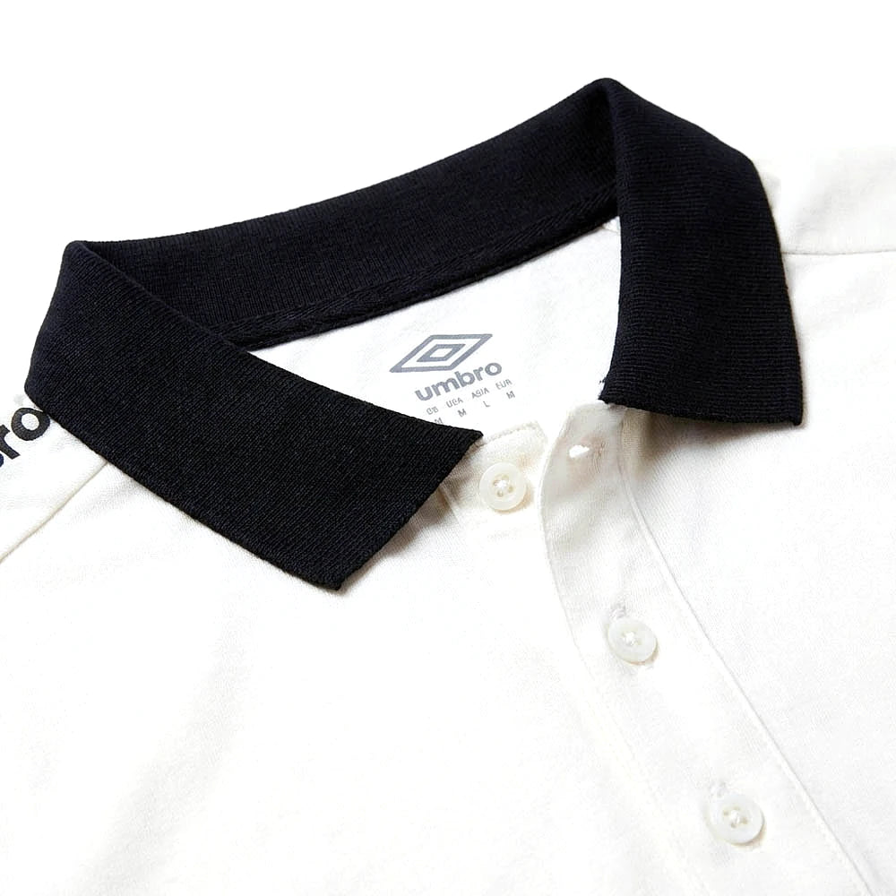 Umbro Polo Blanc — col marine et patte à boutons, original BirdNova Algérie