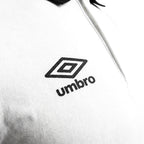 Umbro Polo Blanc — logo double diamant foncé, original BirdNova Algérie
