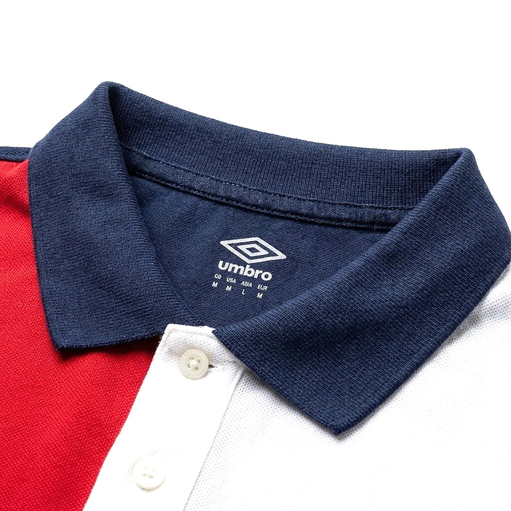 Umbro Polo Colorblock — col marine et patte à boutons, original BirdNova Algérie