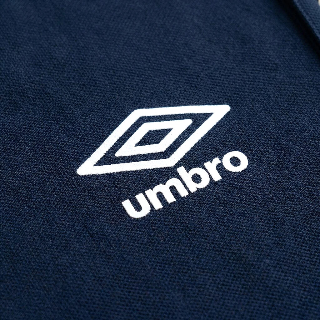 Umbro Polo Bicolore — logo double diamant blanc sur marine, original BirdNova Algérie