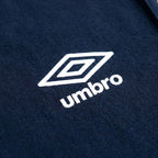 Umbro Polo Bicolore — logo double diamant blanc sur marine, original BirdNova Algérie