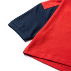 Umbro Polo Bicolore — manche marine et bande rouge Umbro, original BirdNova Algérie