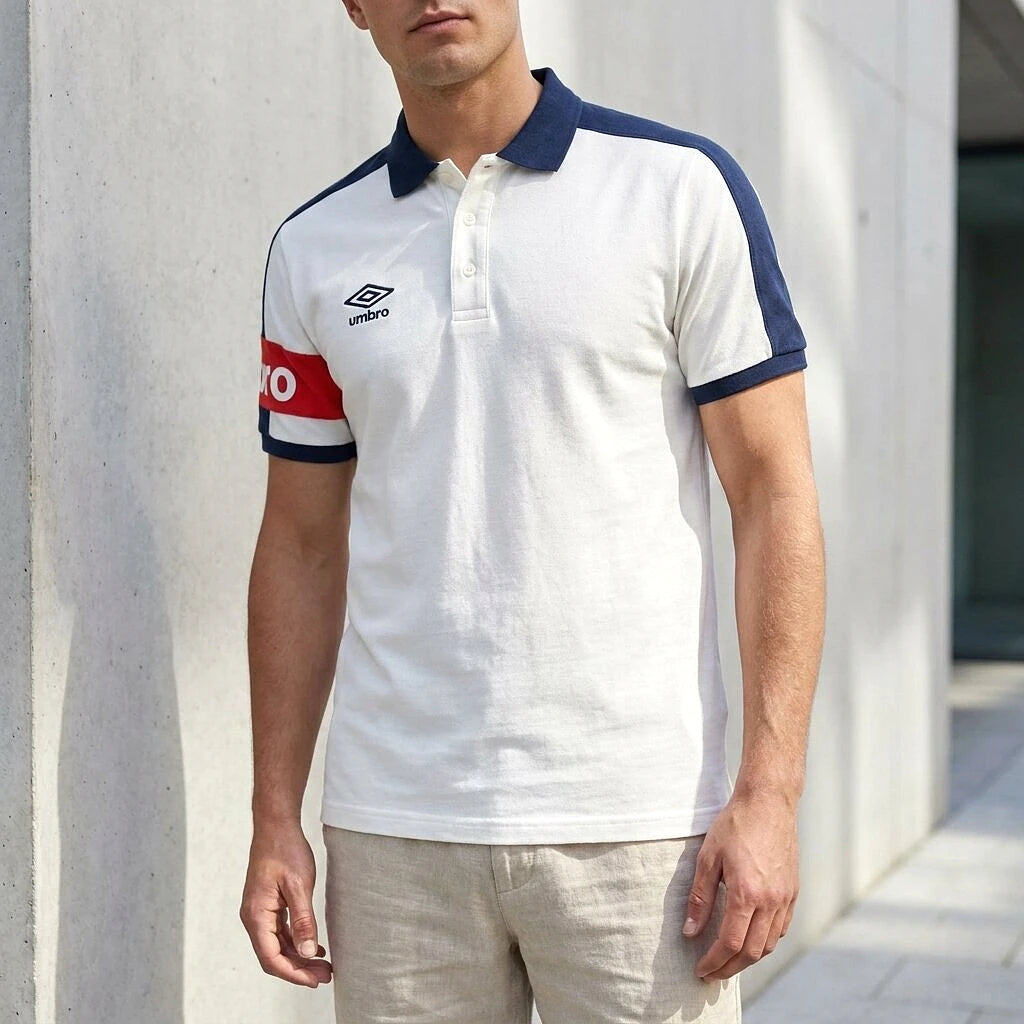 Umbro Polo Blanc brassard rouge porté par un homme — original BirdNova Algérie
