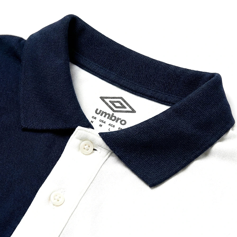 Umbro Polo Blanc — col marine et patte à boutons, original BirdNova Algérie