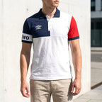 Umbro Polo Blanc Marine Et Rouge porté par un homme — original BirdNova Algérie