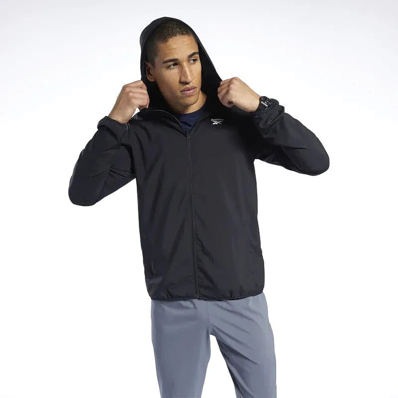 Reebok Veste Noire Homme, vue de face portée avec capuche relevée, BirdNova Algérie