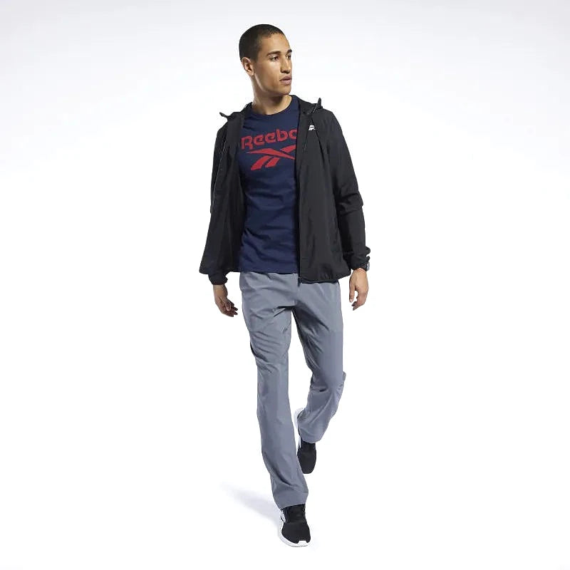 Reebok Veste Noire, vue en pied portée avec t-shirt et jogging gris, BirdNova Algérie