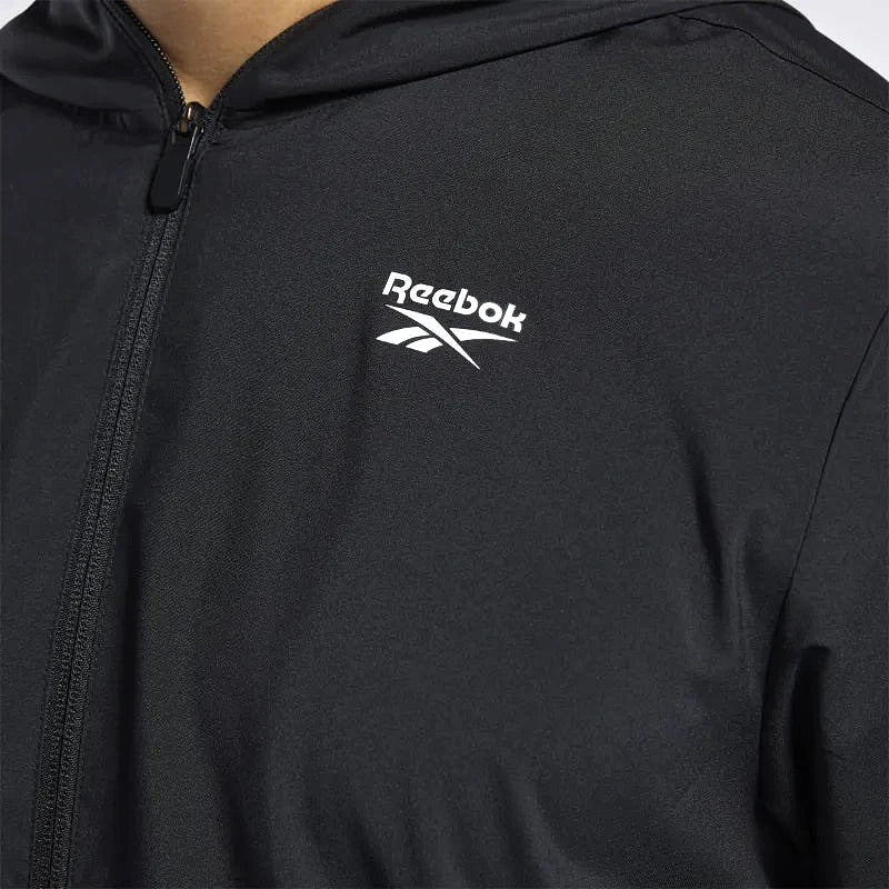 Reebok Veste Noire, gros plan sur le petit logo Reebok et le zip, BirdNova Algérie
